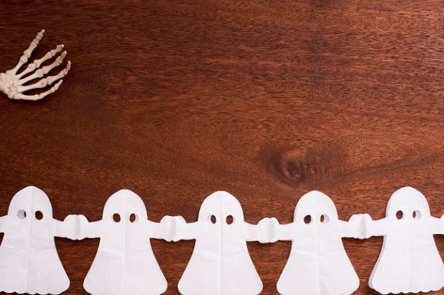 a background image of various halloween decorations on wood