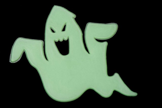 green glowing comic looking halloween ghost shaped decoration