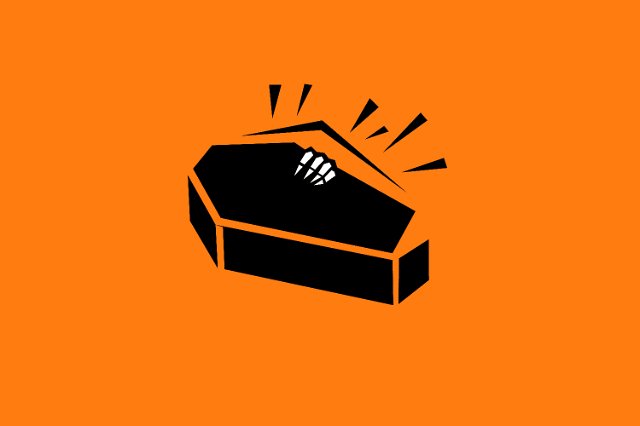a creepy skeleton hand coming from inside a coffin on halloween orange background