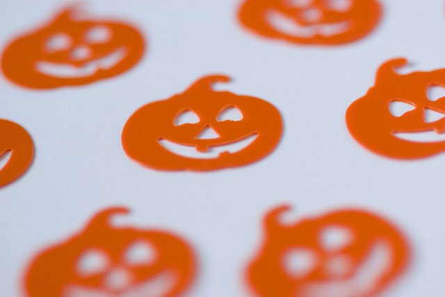 background of orange plastic jack-o-lantern for halloween