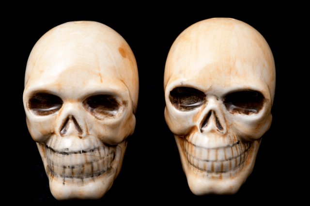 a pair of matching ceramic sulls